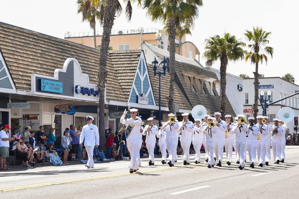 Navy Band Southwest marches in Oceanside Independence Day Parade.