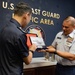 U.S. Coast Guard Pacific Area commander exchanges gifts with Singapore Police Coast Guard commander