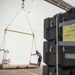Sailors load medical supplies onto USNS Comfort