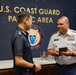 U.S. Coast Guard Pacific Area commander presents gift to Singapore Police Coast Guard leadership