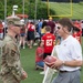 Team Whiteman members visit with the Chiefs