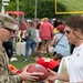 Team Whiteman members visit with the Chiefs