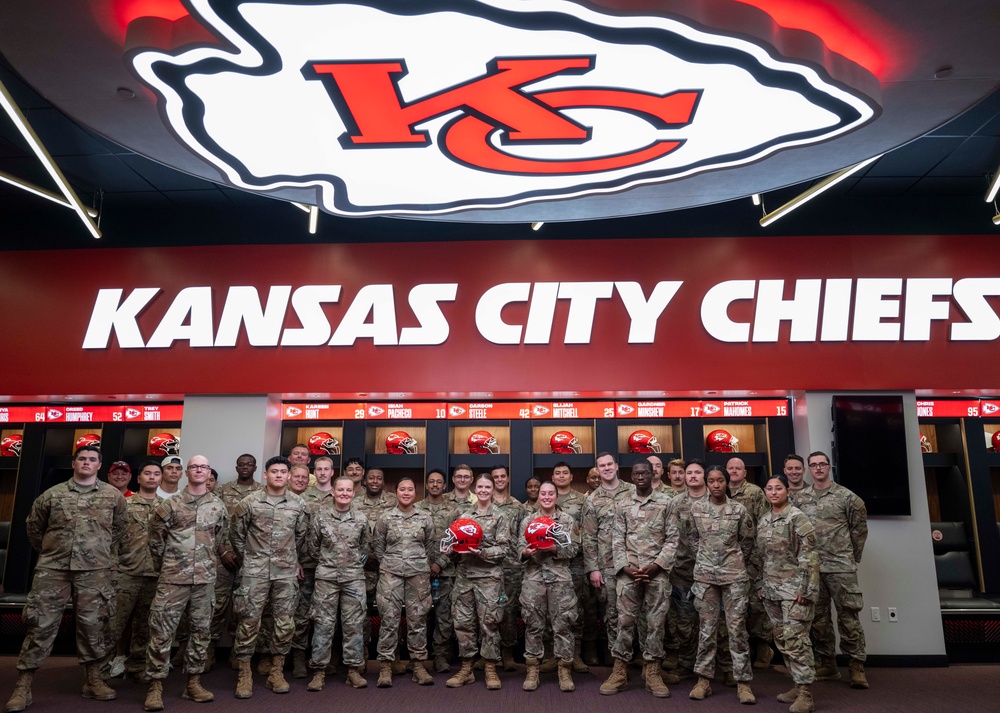 Team Whiteman members visit with the Chiefs