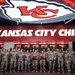 Team Whiteman members visit with the Chiefs