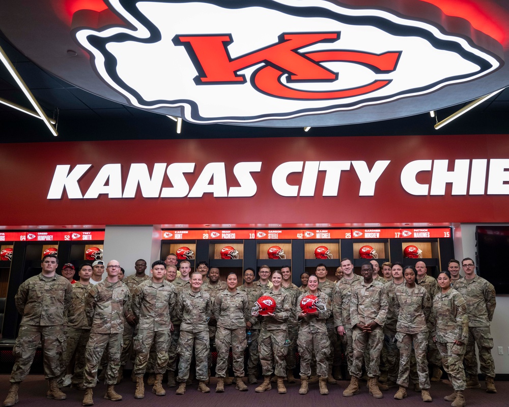 Team Whiteman members visit with the Chiefs