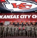 Team Whiteman members visit with the Chiefs