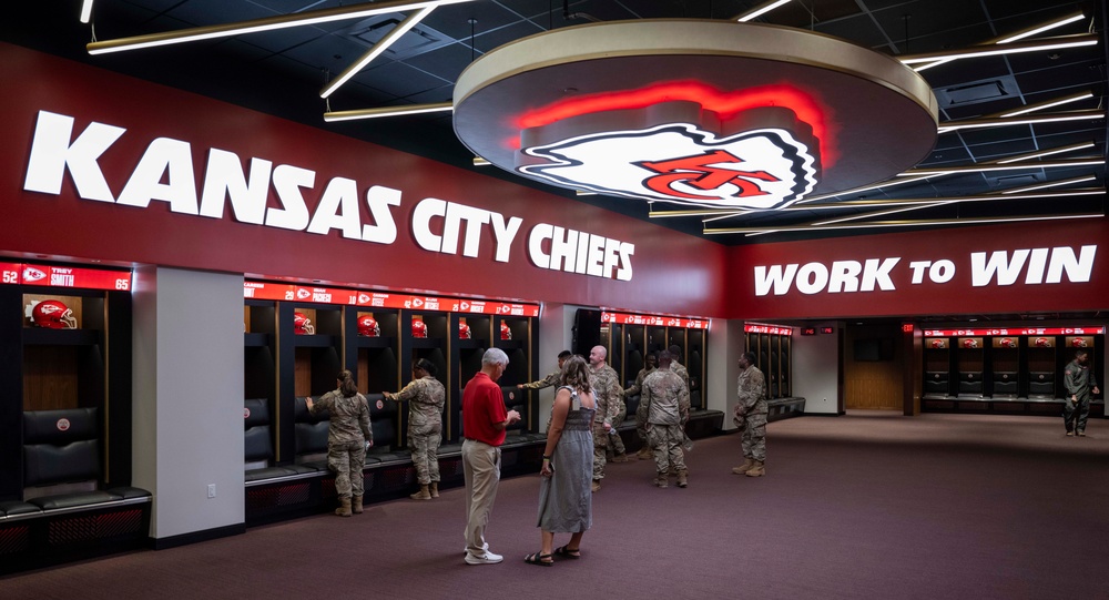 Team Whiteman members visit with the Chiefs