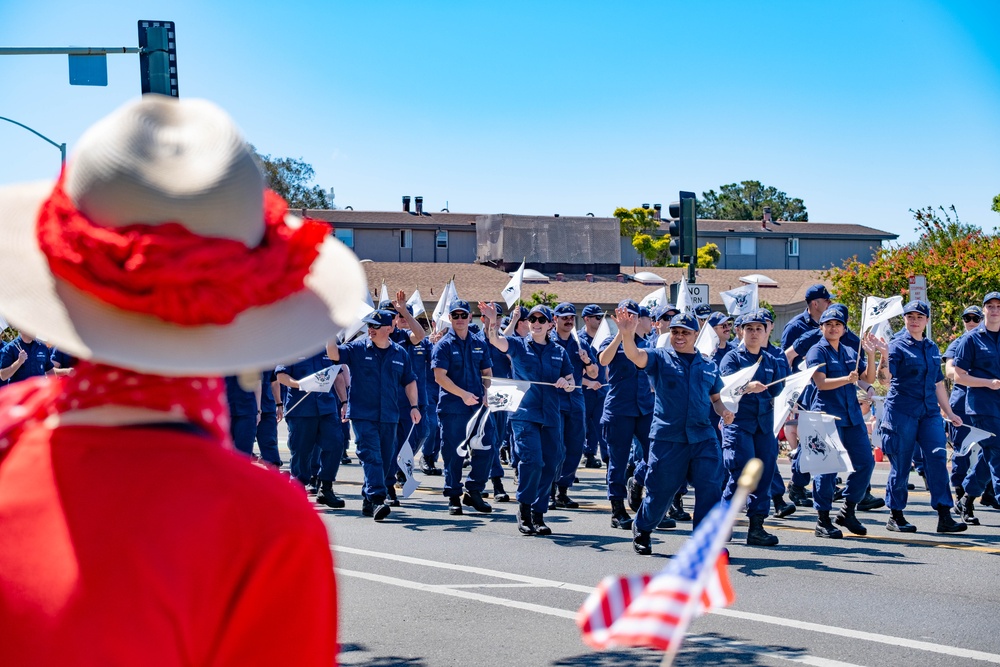 U.S. Coast Guard members march in annual 4th of July parade