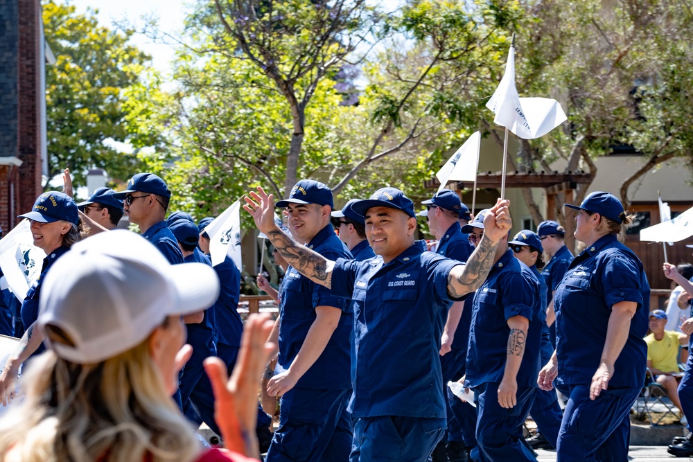 U.S. Coast Guard members march in annual Fourth of July parade
