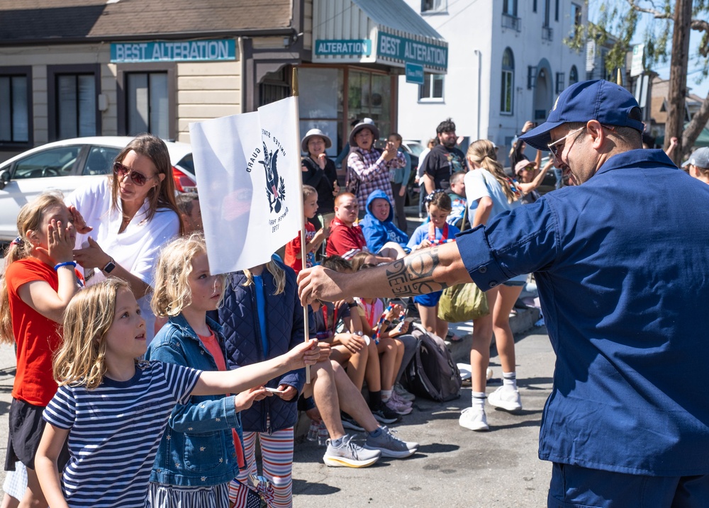 U.S. Coast Guard members march in annual Fourth of July parade