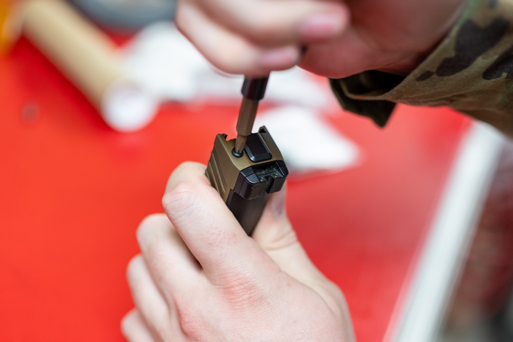 Holloman Combat Arms Training and Maintenance cadre make students and equipment ready for battle