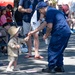 U.S. Coast Guard members march in annual Fourth of July parade