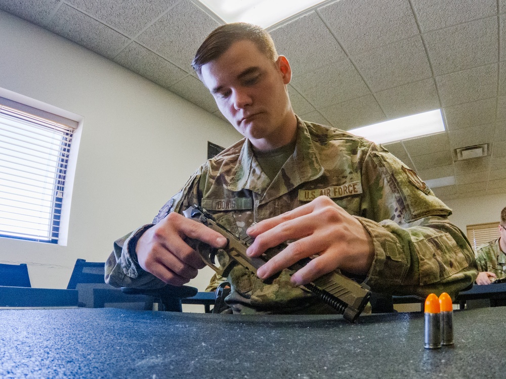 Holloman Combat Arms Training and Maintenance cadre make students and equipment ready for battle