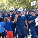 U.S. Coast Guard members march in annual Fourth of July parade