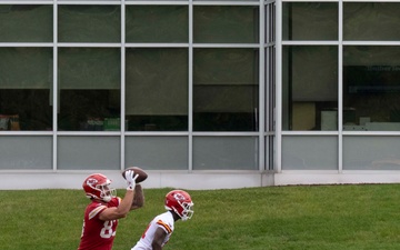 Team Whiteman members visit with the Chiefs