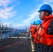 SA Marques Henry and crew members man the rails during a replenishment-at-sea