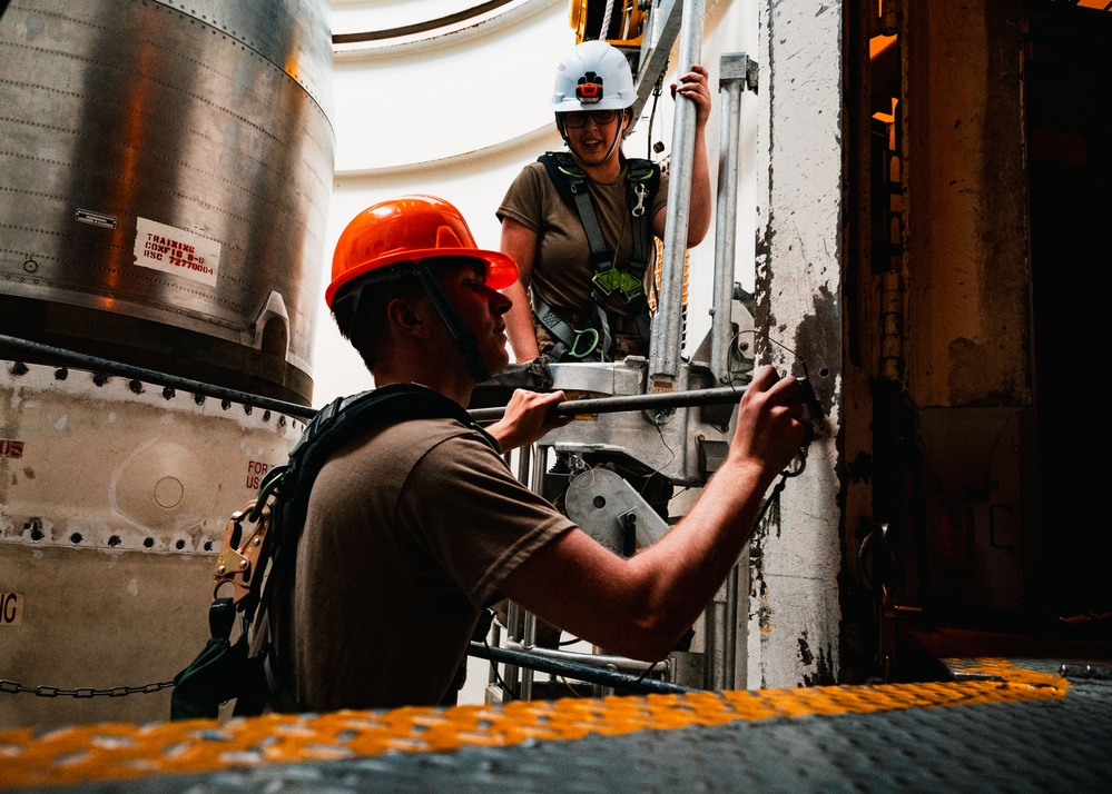 Hands-On Missile Maintenance: Airmen Train Inside Simulated Launch Tube