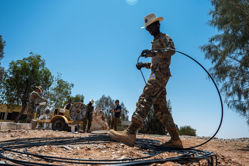 202nd EIS “Cable Dawgs” install fiber optic cable