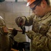Plumbers with the South Dakota Army National Guard conduct bathroom restoration project
