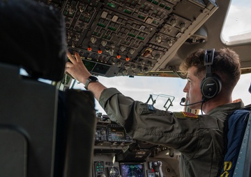 326th Airlift Squadron demonstrates air mobility during NASCAR flyover