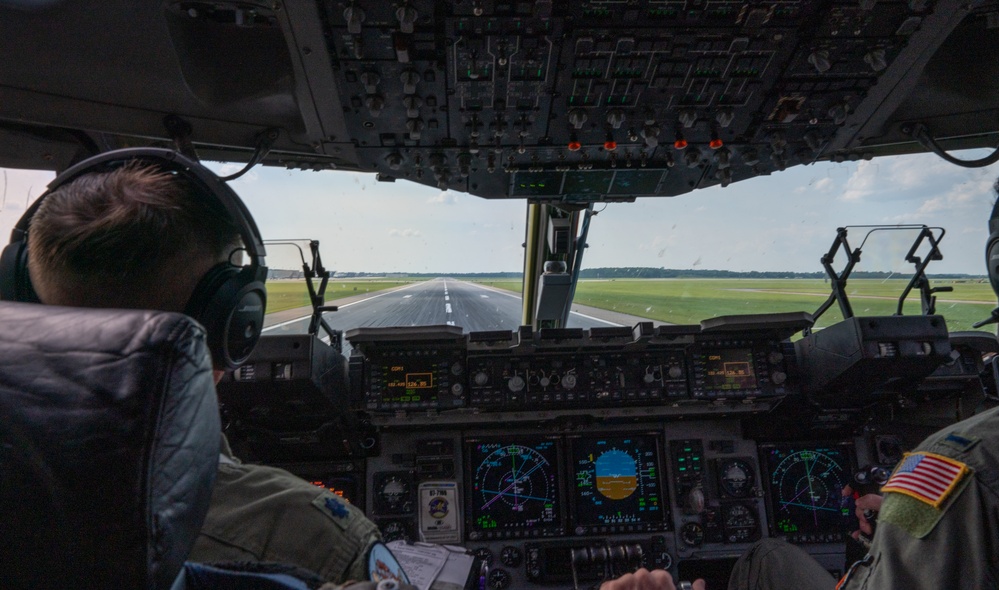 326th Airlift Squadron demonstrates air mobility during NASCAR flyover