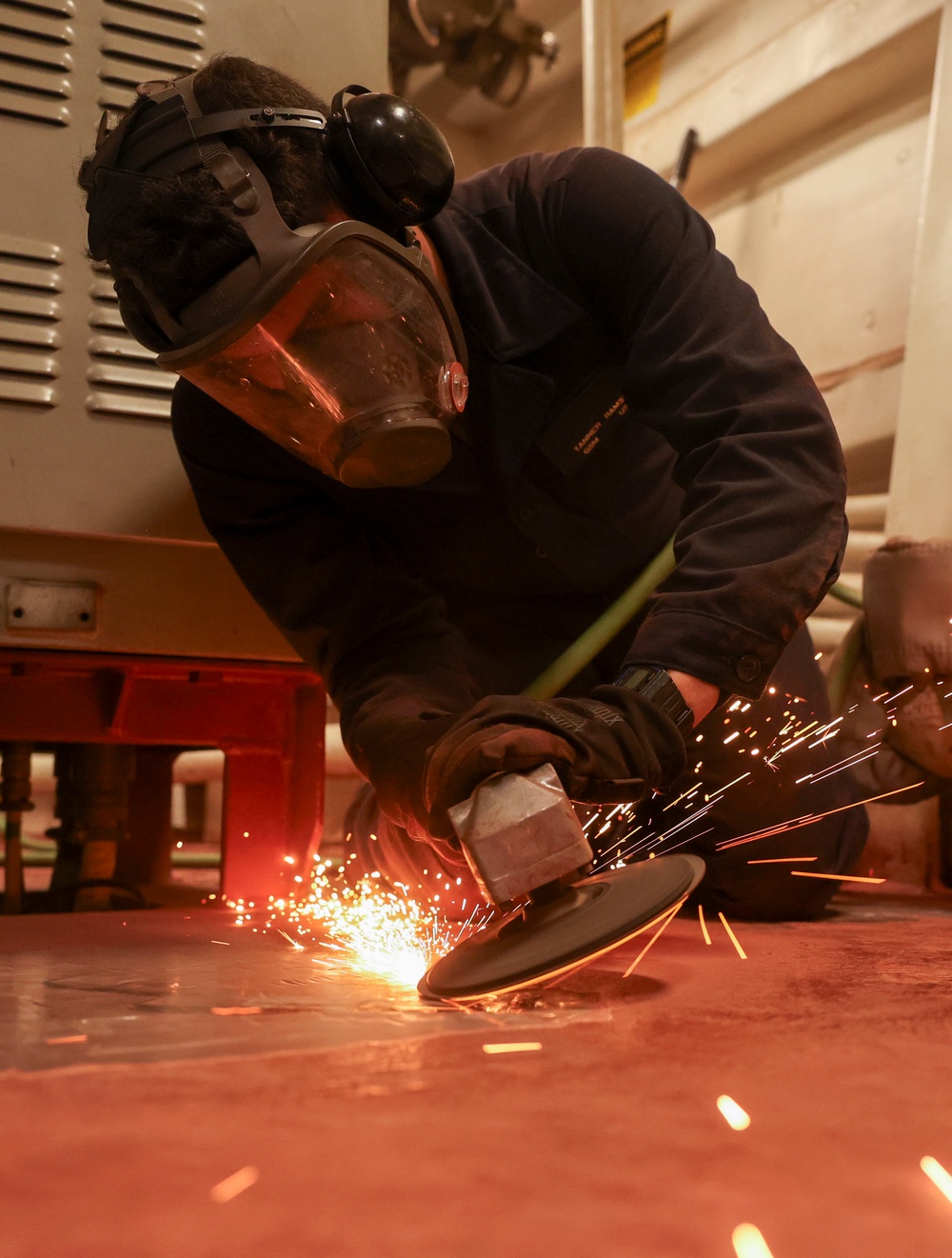 USS Bainbridge (DDG 96) Sailor Conducts Preservation Maintenance