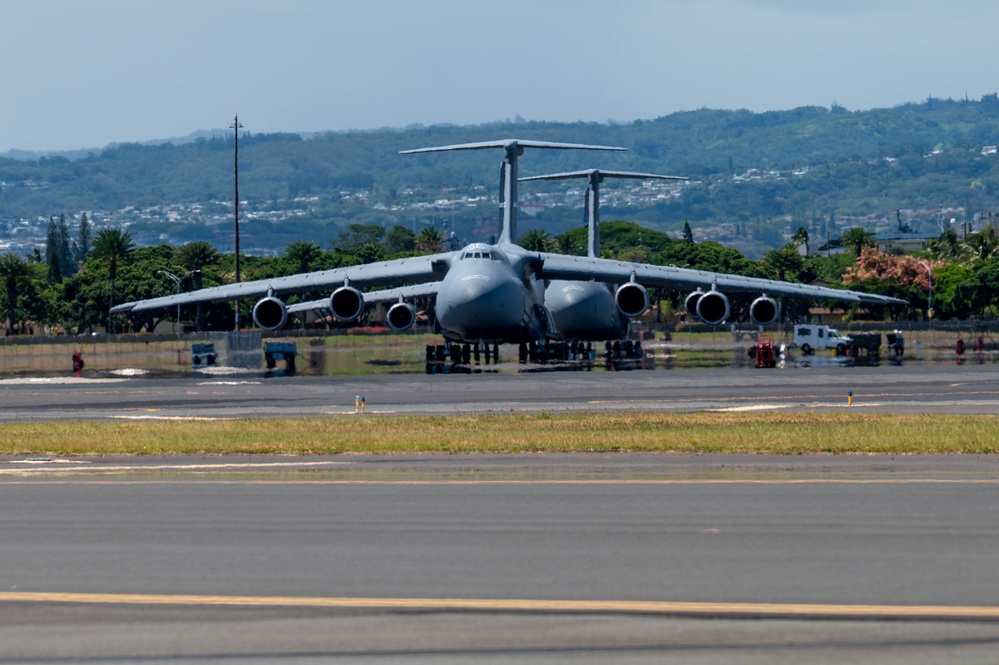 U.S. Air Force aircraft land at Joint Base Pearl Harbor-Hickam in support of REFORPAC 25