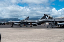 U.S. Air Force aircraft land at Joint Base Pearl Harbor-Hickam in support of REFORPAC 25