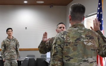 Army engineer reenlists with his daughter at his side in South Korea