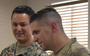 Army engineer reenlists with his daughter at his side in South Korea