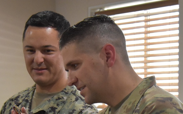 Army engineer reenlists with his daughter at his side in South Korea