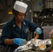 Sailor Prepares Meal