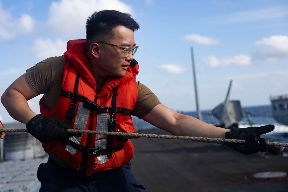 Shoup conducts a replenishment-at-sea