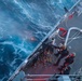 GM1 Don Dume fires the .50cal light machine-gun at an unmanned surface vessel