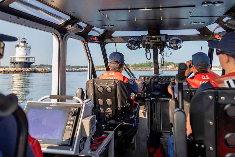 Coast Guard and Auxiliary Support Tri for a Cure Swim Safety in Portland Harbor