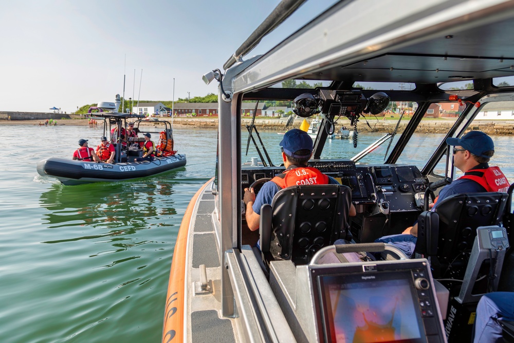 Coast Guard and Auxiliary Support Tri for a Cure Swim Safety in Portland Harbor