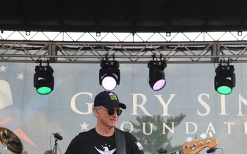 Gary Sinise and Lt. Dan Band Entertain Service Members and Families at Fort McCoy