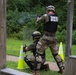Sgt. Luke Entz fires an M500 shotgun - 2025 Best Warrior Competition