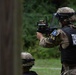 Spc. Canyon Blassingame fires an M320 grenade launcher - 2025 Best Warrior Competition