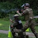 Sgt. Luke Cloward fires an M500 shotgun - 2025 Best Warrior Competition