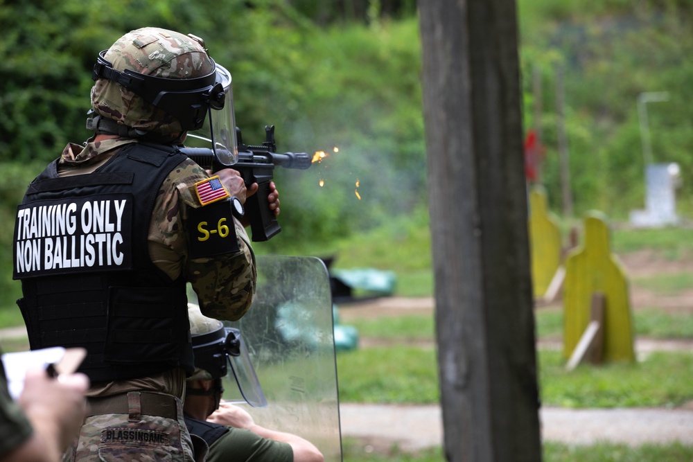Spc. Canyon Blassingame fires an M500 shotgun - 2025 Best Warrior Competition