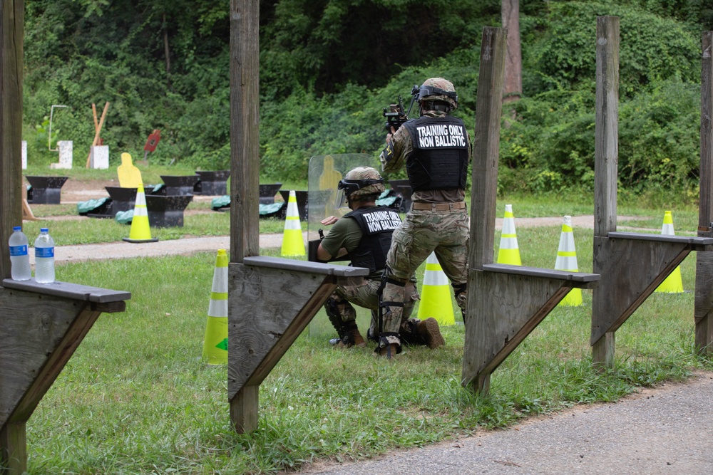 Sgt. Michael Fouts fires an M320 grenade launcher - 2025 Best Warrior Competition