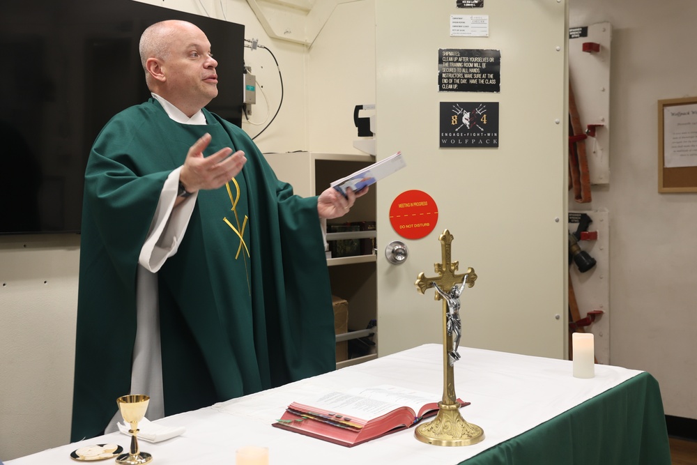 Chaplain Andrew Dutko conducts Catholic Mass aboard the USS Bulkeley