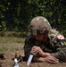 Spc. Jaden Hughes probes for buried landmines during Best Warrior 2025