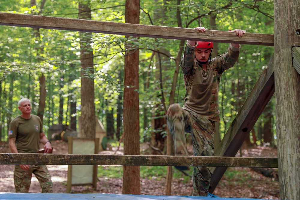 Spc. Adam Andrews Climbs Bars in the Obstacle Course - 2025 National Best Warrior