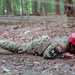 Sgt. Kristopher Piwowarczyk crawls in the obstacle Course - 2025 National Best Warrior