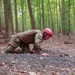 Sgt. Matthew Lee crawls in a obstacle course - 2025 National Best Warrior