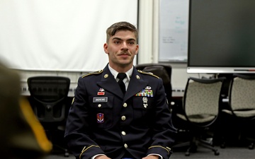Competitors in the National Guard's 2025 National Best Warrior Competition appear before the board