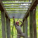 Sgt. Matthew Lee swings from bars in an obstacle course - 2025 National Best Warrior