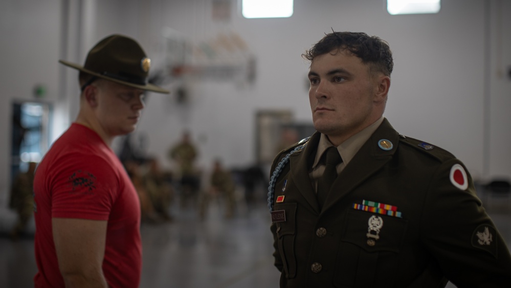 Spc. Logan J. Rutledge under pressure during drill and ceremony at Best Warrior 2025